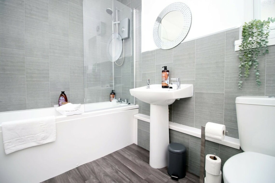 Bathroom with shower and bath