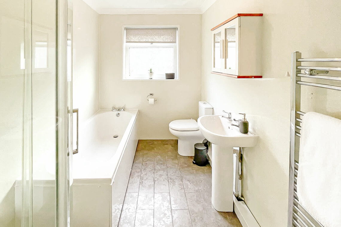 Bathroom with bath & shower
