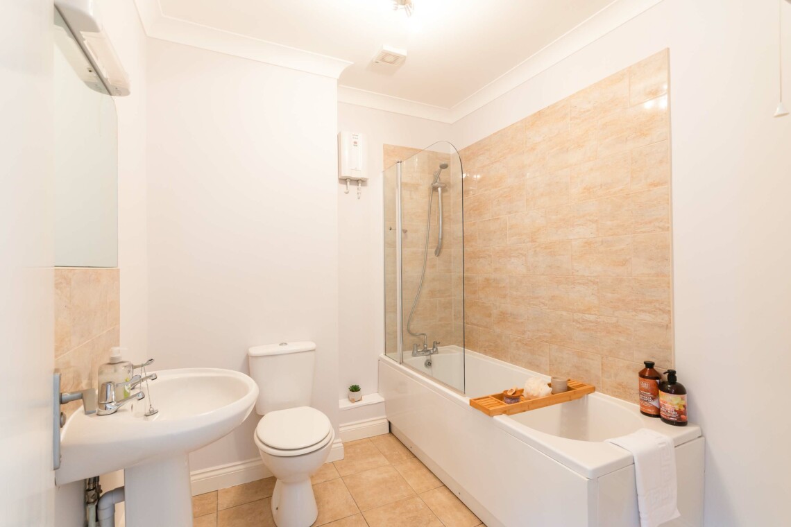 Bathroom with shower over bath
