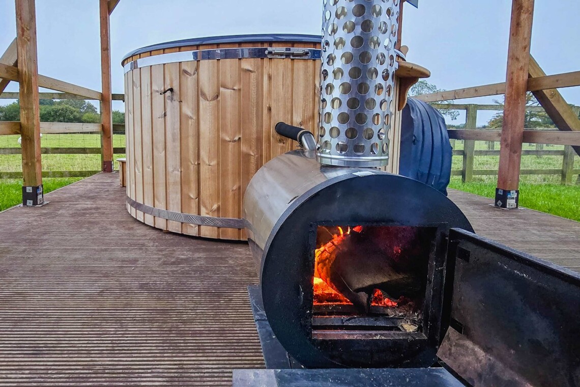 Relax in the wood fired hot tub for Reindeer Lodge guest only 