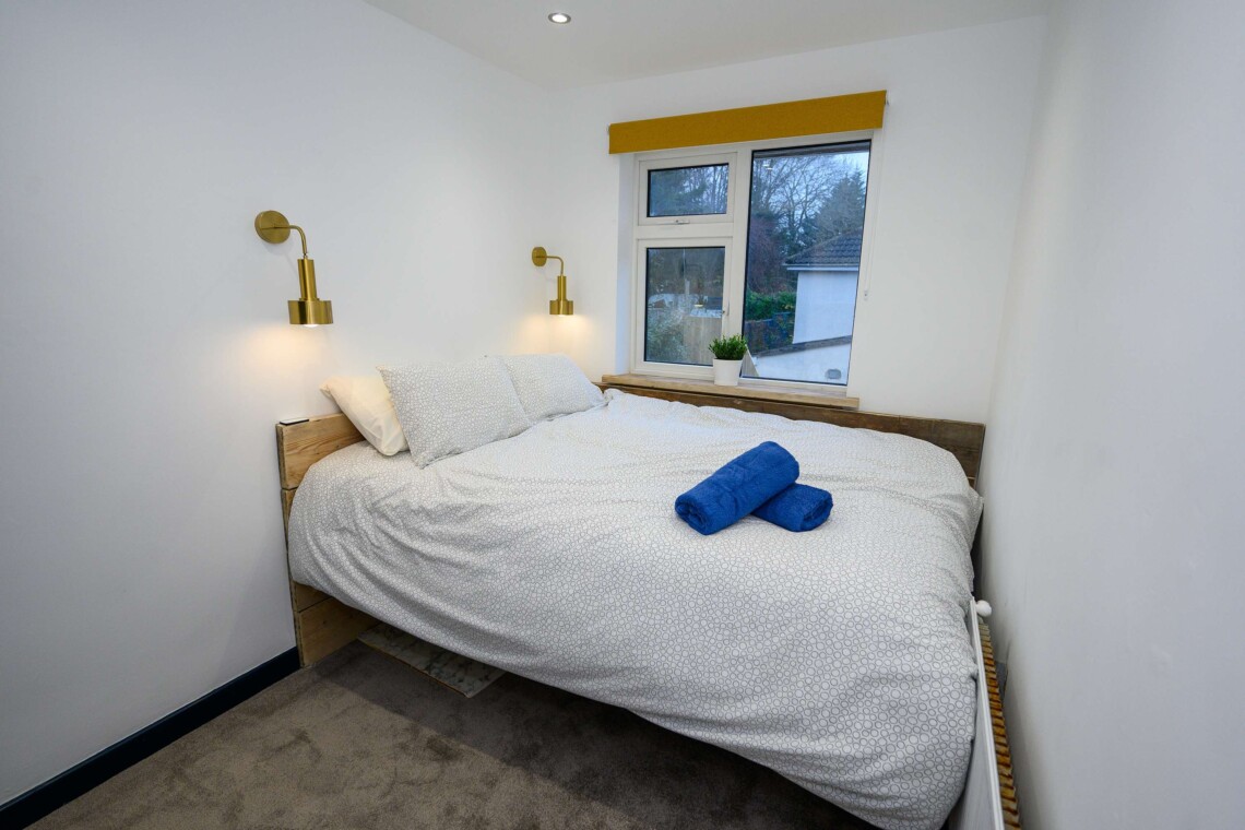 Open plan living area which contains comfortable sofa where you can relax watching the widescreen smart TV.