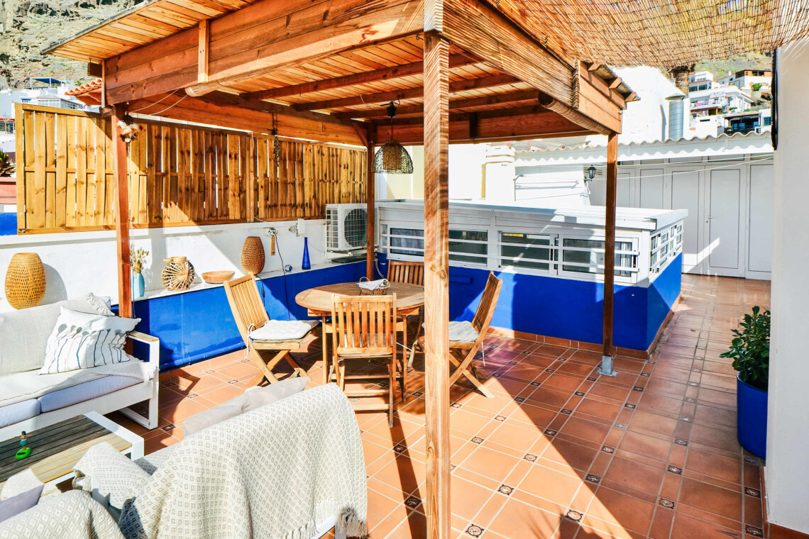 The terrace comes complete with a dining table, lounge area, and other amenities such as outdoor shower, making it a perfect spot to enjoy meals and soak up the sun.