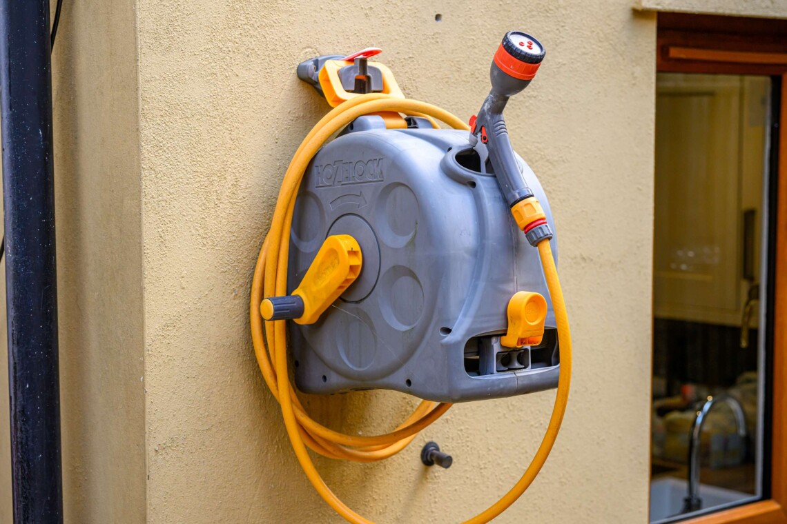 Garden hose for clean bikes or dirty boots after a long walk