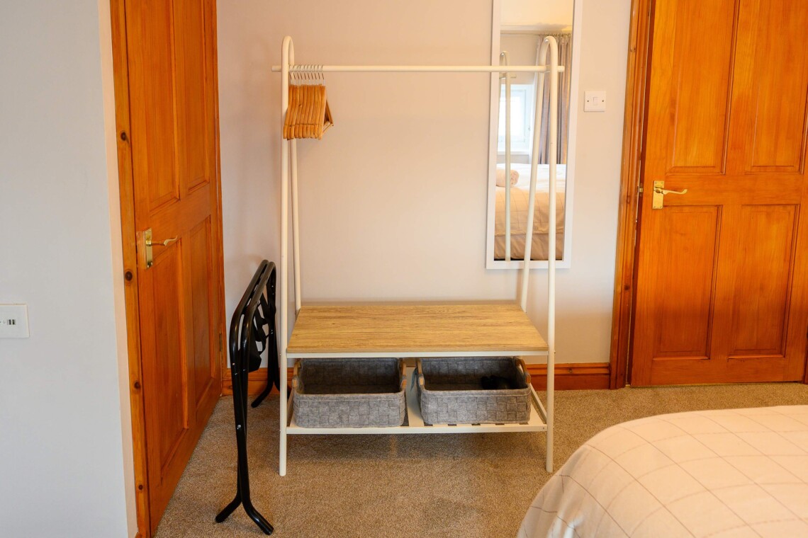 Clothes hanging and storage space, hair dryer supplied 