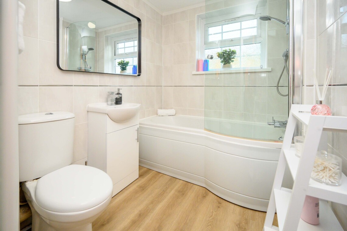Bathroom with bath and shower