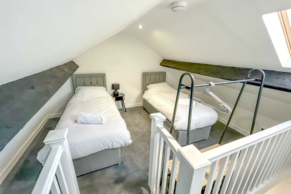 Two single beds in the converted attic area