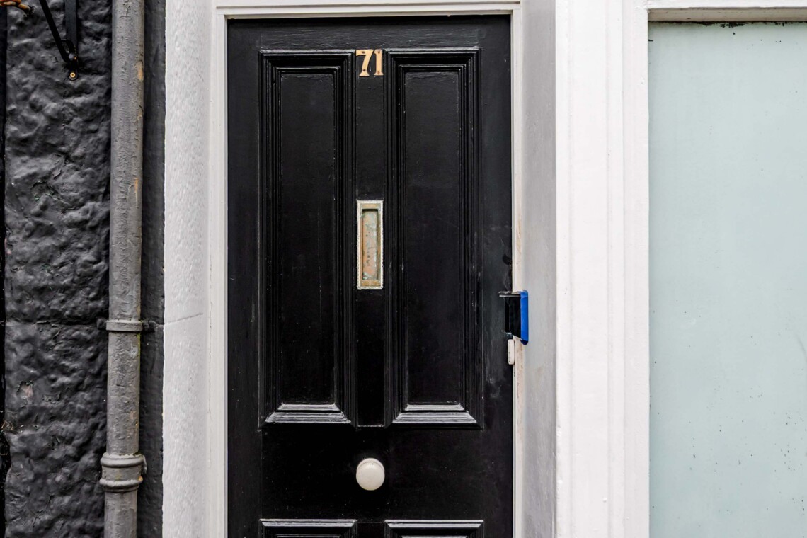 The building's entrance is on Devonport Road. next to Stoke Barbers. When you enter through the front door, you will pass through a short corridor to find the entrance to the apartment. 