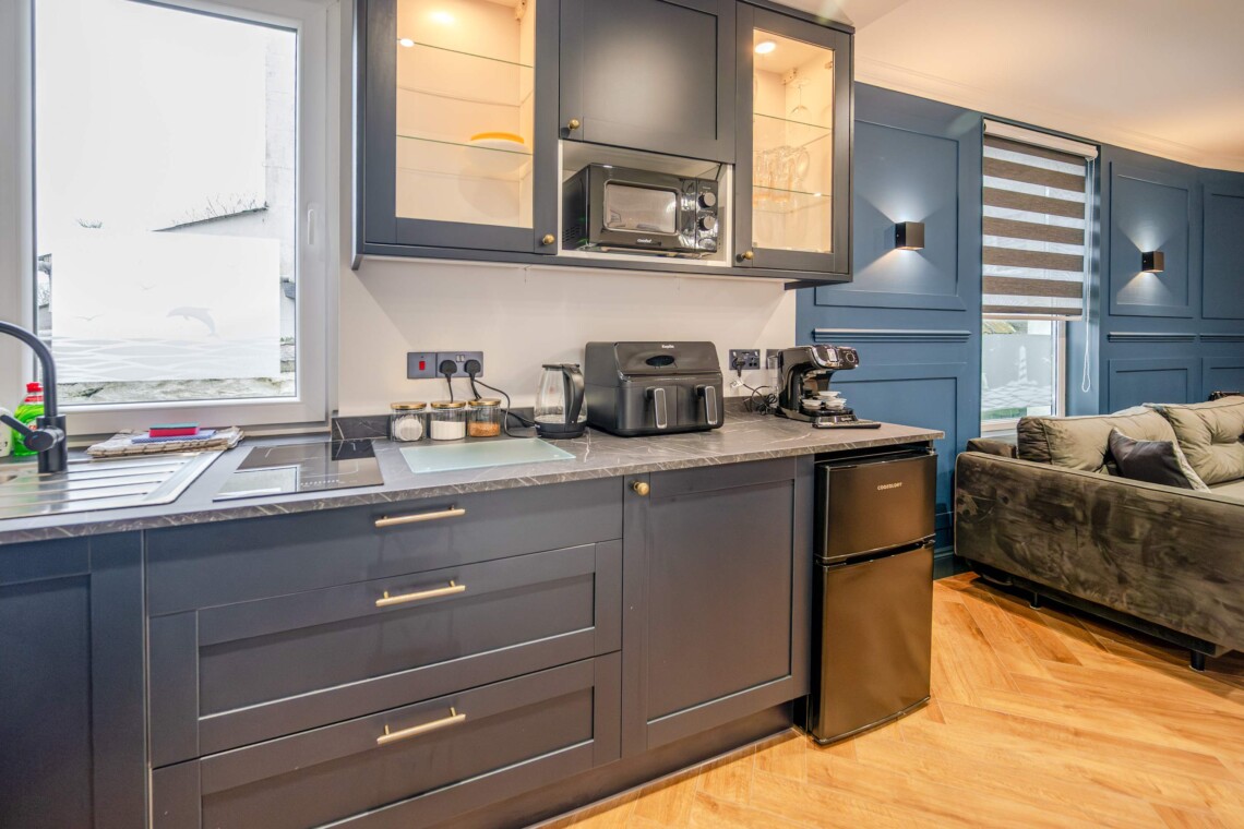 The kitchen has everything you could possibly need for your stay including utensils, kettle, toaster, fridge, microwave and hob. Please note there is no oven.