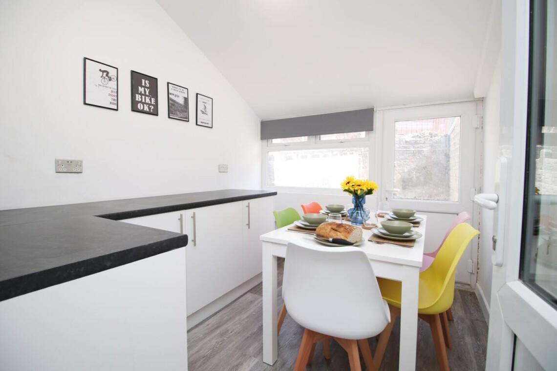 The fully equipped kitchen is ready for your culinary adventures, with everything you need to make delicious homemade meals. 