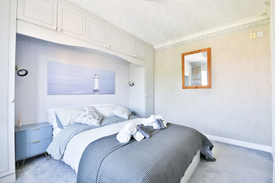 Peaceful and overlooking the rear garden; this room features a comfortable double bed.