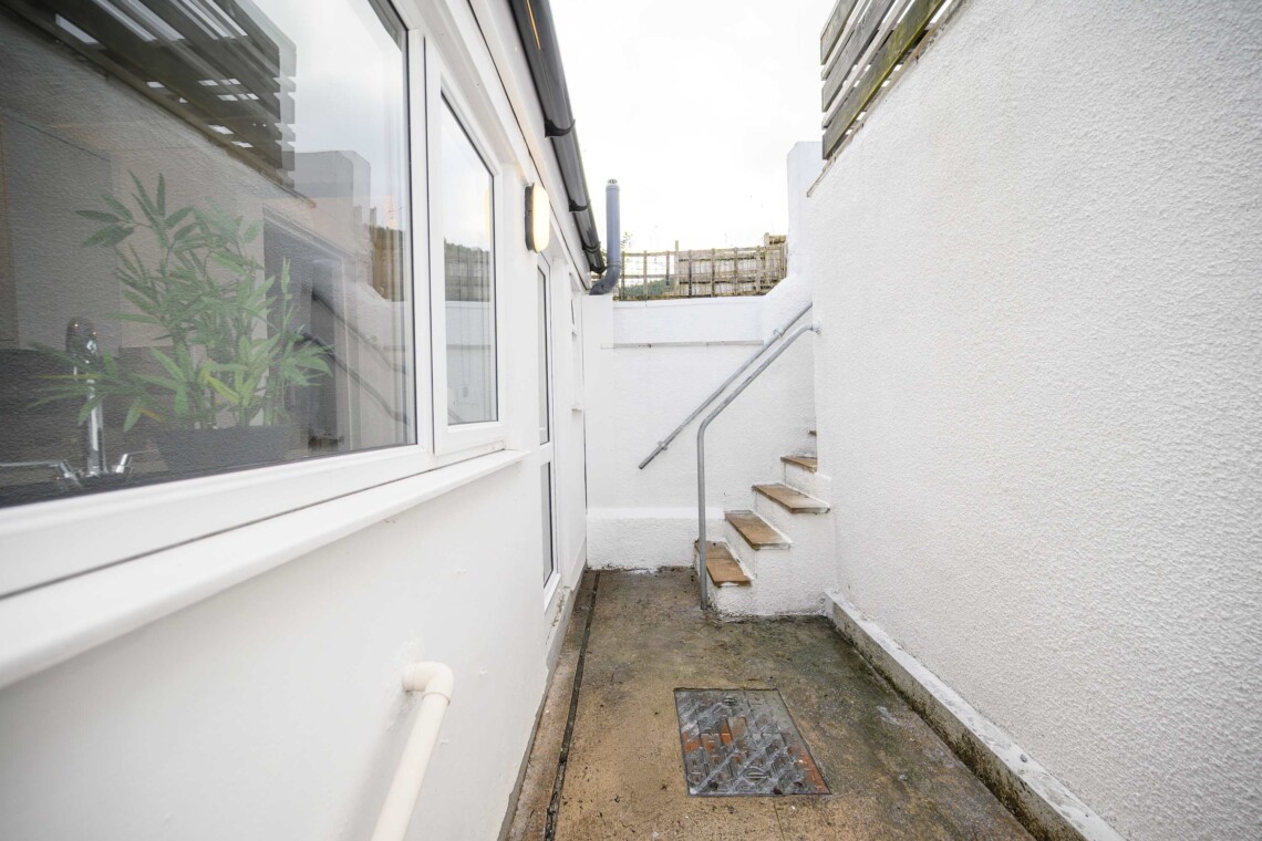 Convenient outside water tap for cleaning walking boots or bicycles