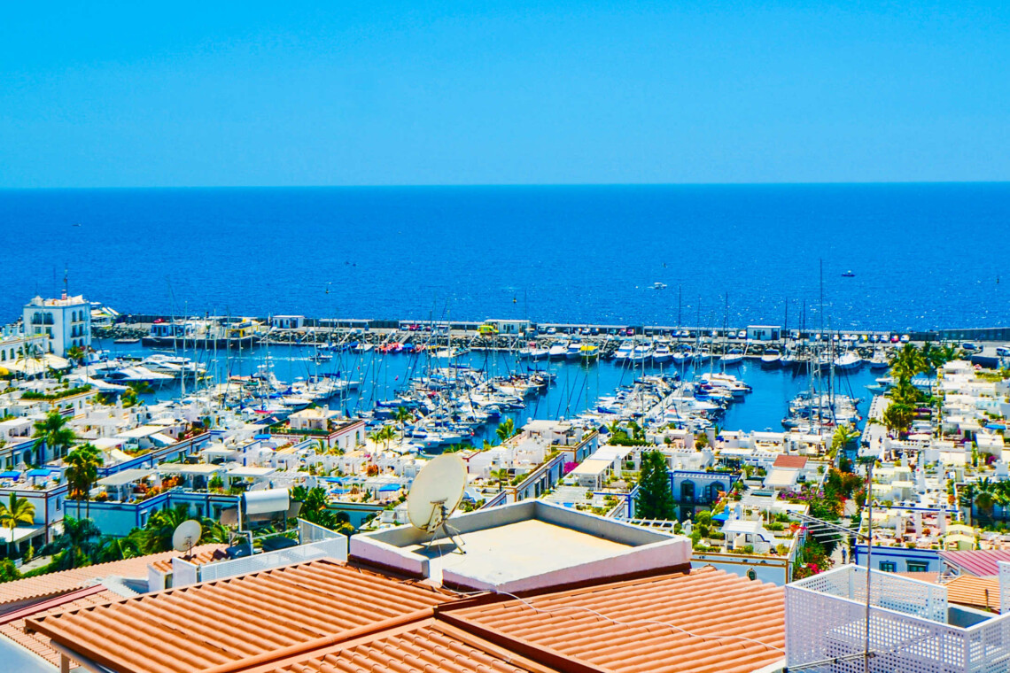 Roof terrace with incredible views looking out over Playa de Mogan and the marina