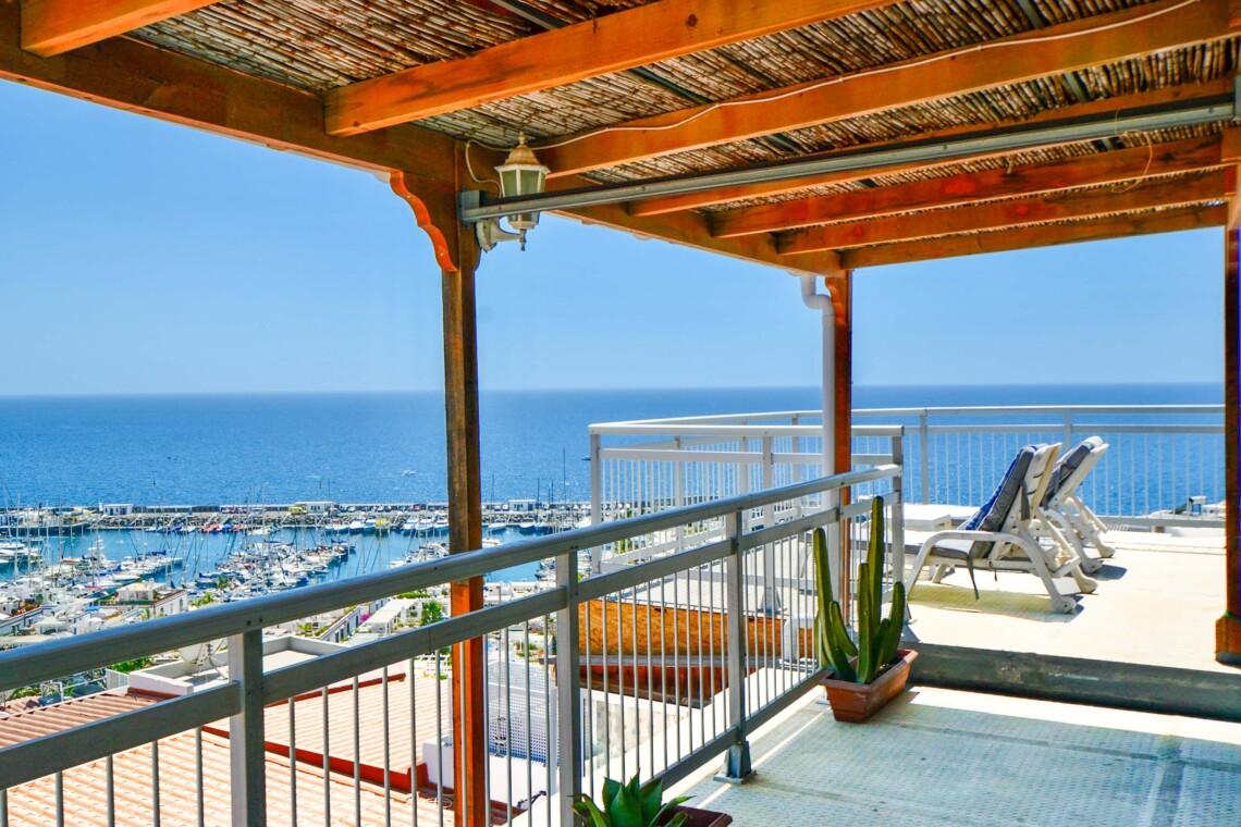 There is an enormous roof terrace with incredible views looking out over Playa de Mogan and the marina