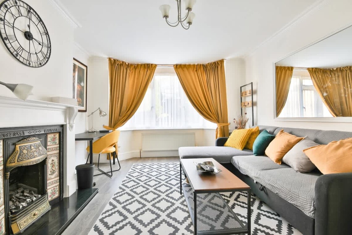 Living area with a super-comfortable L-shaped sofa bed and a dedicated work area. Use it as a lounge or convert it into an extra bedroom if needed.
