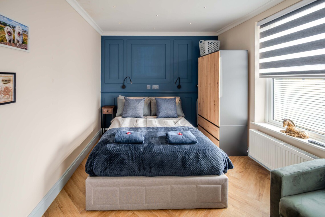 The studio contains a double bed, offering a comfortable and restful retreat.