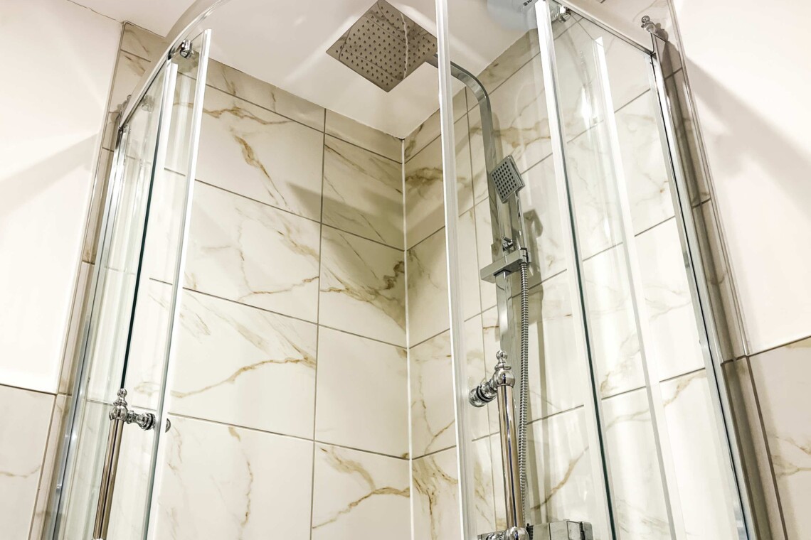 Bathroom with heated towel rail & LED mirror