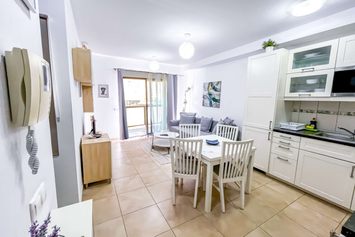 The living room also opens to the balcony