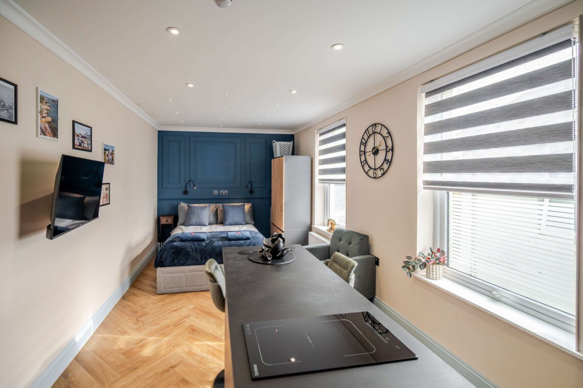 A cosy lounge includes sofa, smart TV and dining table for your nights in.