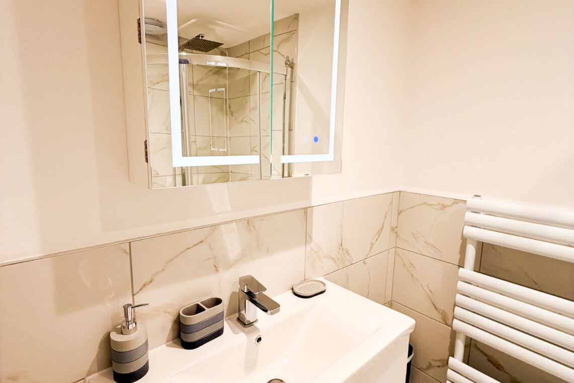 Bathroom with Heated Towel Rail & LED Mirror