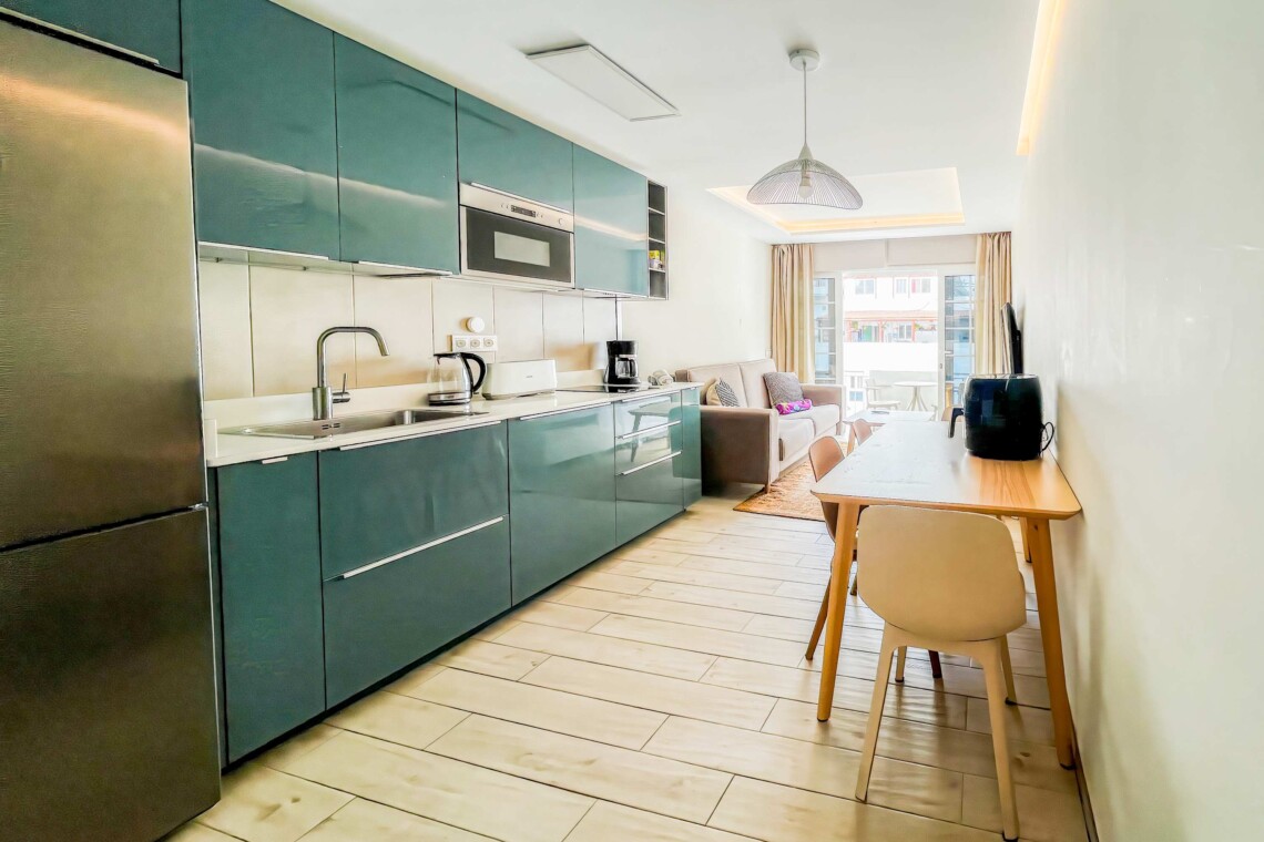 The brand-new, fully equipped kitchen includes a hob, coffee machine, freezer, and everything needed for a relaxed self-catering stay