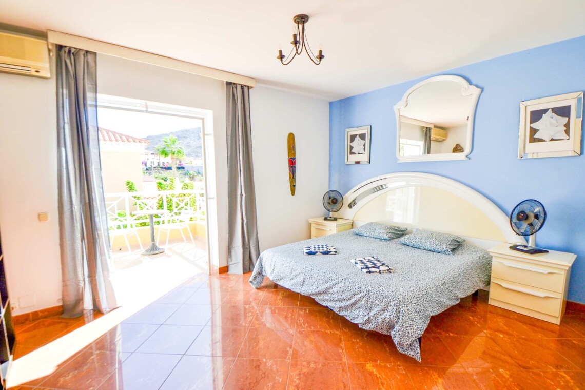 Master bedroom with balcony