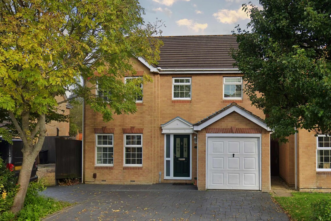 Front entrance with plenty of private driveway parking.