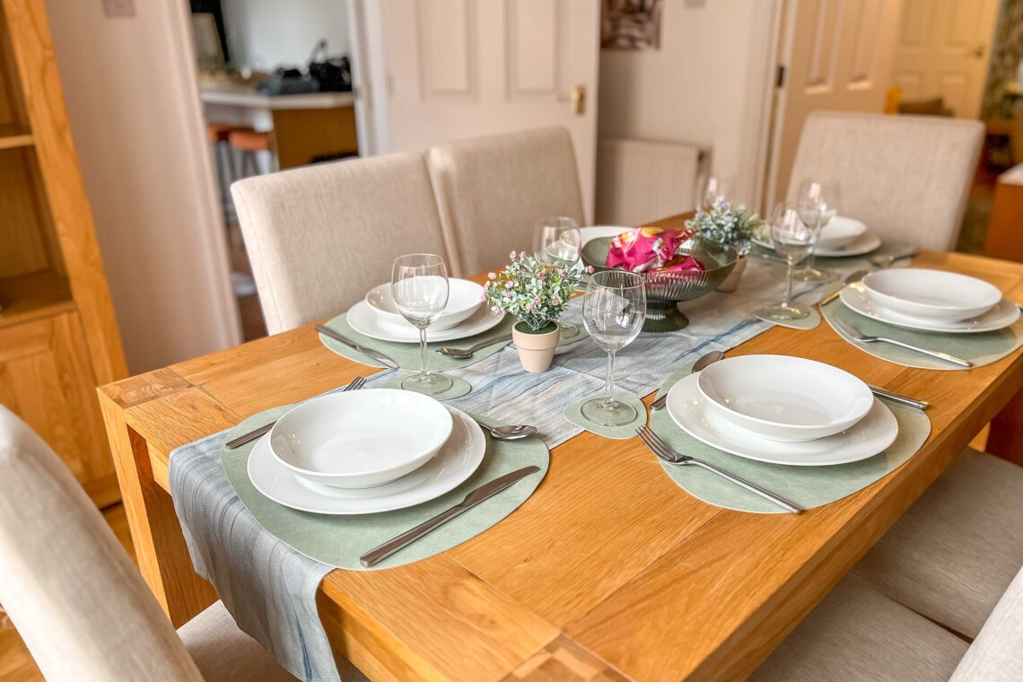 Dining area, featuring a generous table and six comfortable chairs