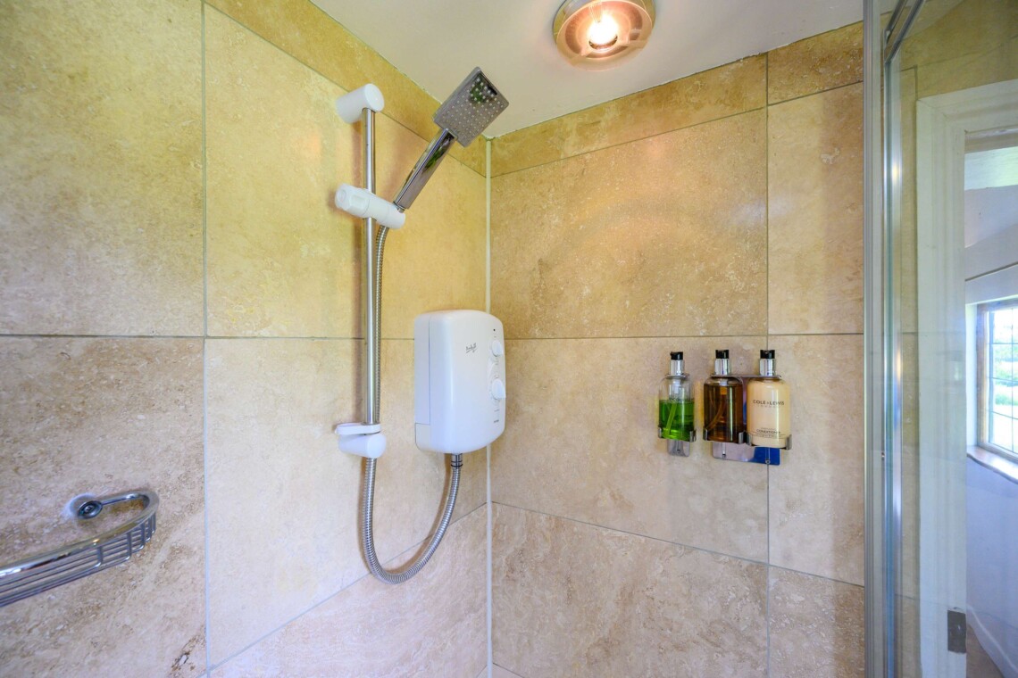 Full bathroom with complimentary shampoo, body soap, and shower gel provided
