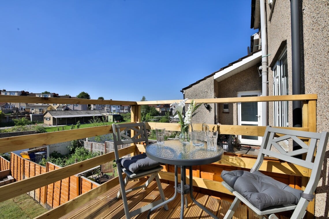 Raised decking area accessed from dinning area