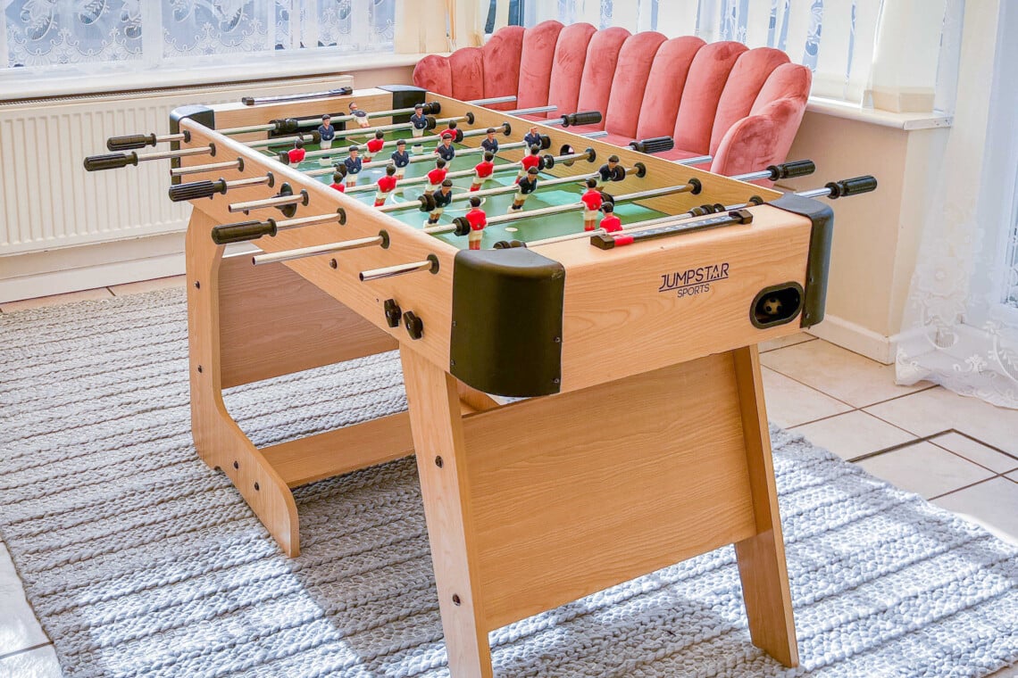 Fun indoor foosball table ready for family entertainment and friendly competition.